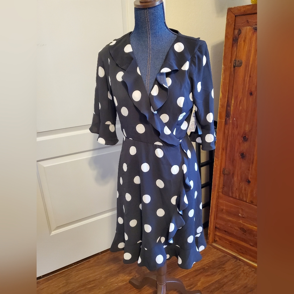 Classic Polka dot flutter hem dress